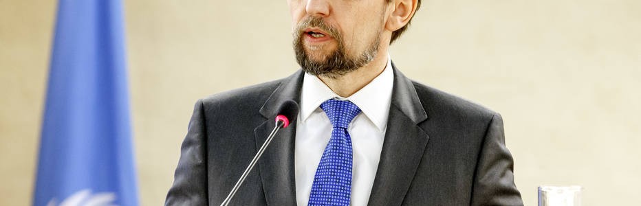 FILE - In this Feb. 27, 2017 file photo, U.N. High Commissioner for Human Rights, Jordan's Zeid Ra'ad al Hussein, delivers his statement  at the Human Rights Council,  in Geneva, Switzerland. The U.N. human rights chief says Wednesday, March 8, 2017  he is “dismayed” by U.S. President Donald Trump’s attempts to “intimidate or undermine” journalists and judges, and is concerned about the impact of Trump’s order banning U.S. entry to people of six mostly Muslim countries. (Salvatore Di Nolfi/Keystone via AP.file)